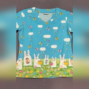 Adorable Easter scrub top. Gently used condition. Not sure though if L or XL.